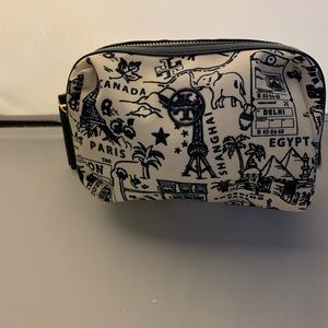 Tory Burch Toile print, inspired by world travel small nylon cosmetic bag.